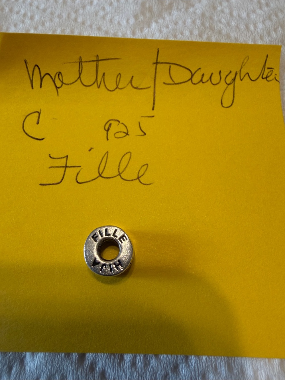Camilla Silver-Tone Round 'FILLE' Bead Charm on Yellow Card